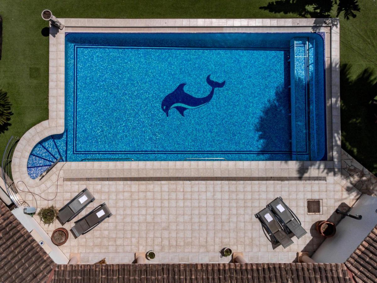 Villas Guzman - Acacias เบนิสซา ภายนอก รูปภาพ